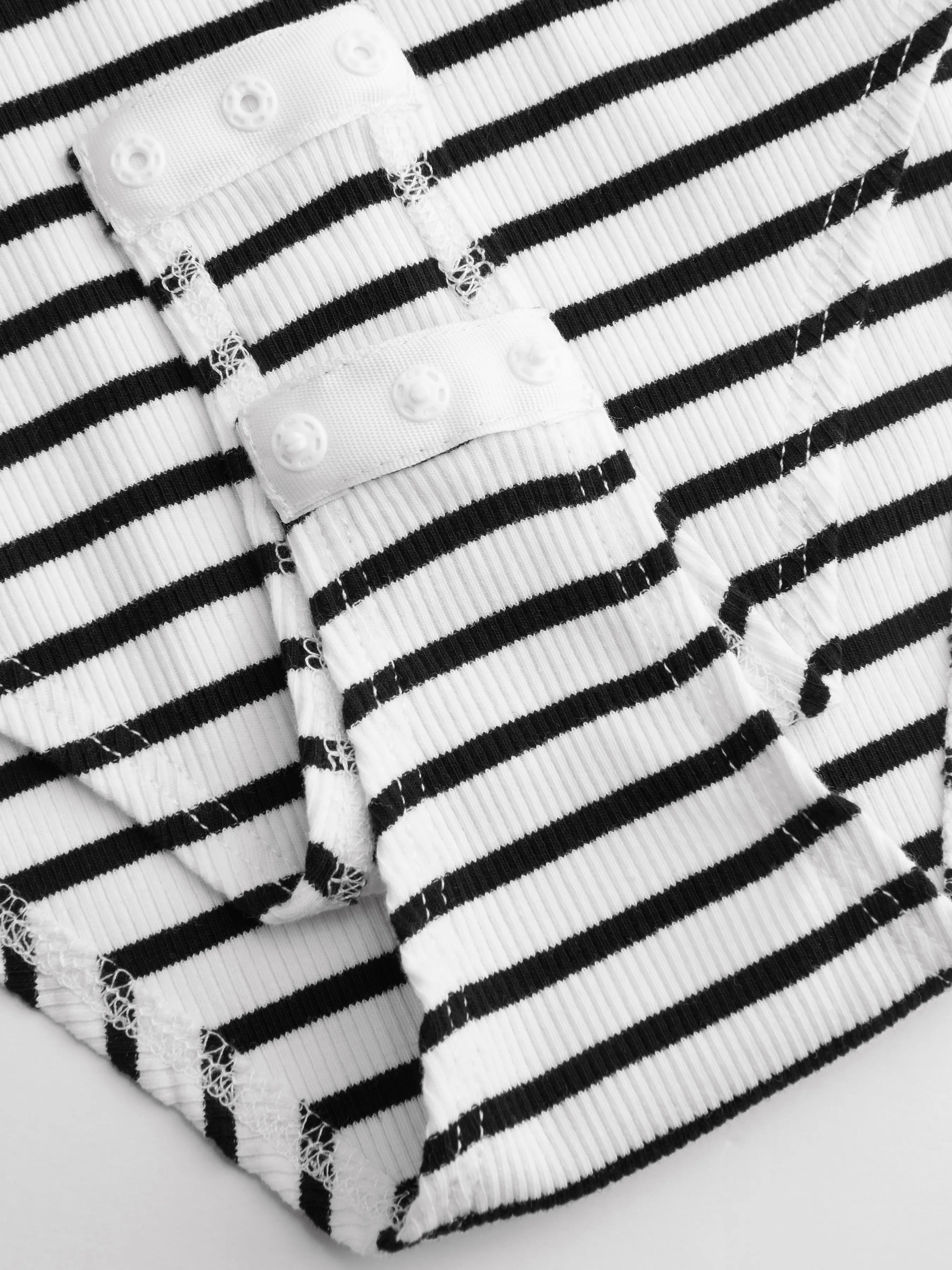 Body de rayas con cuello redondo