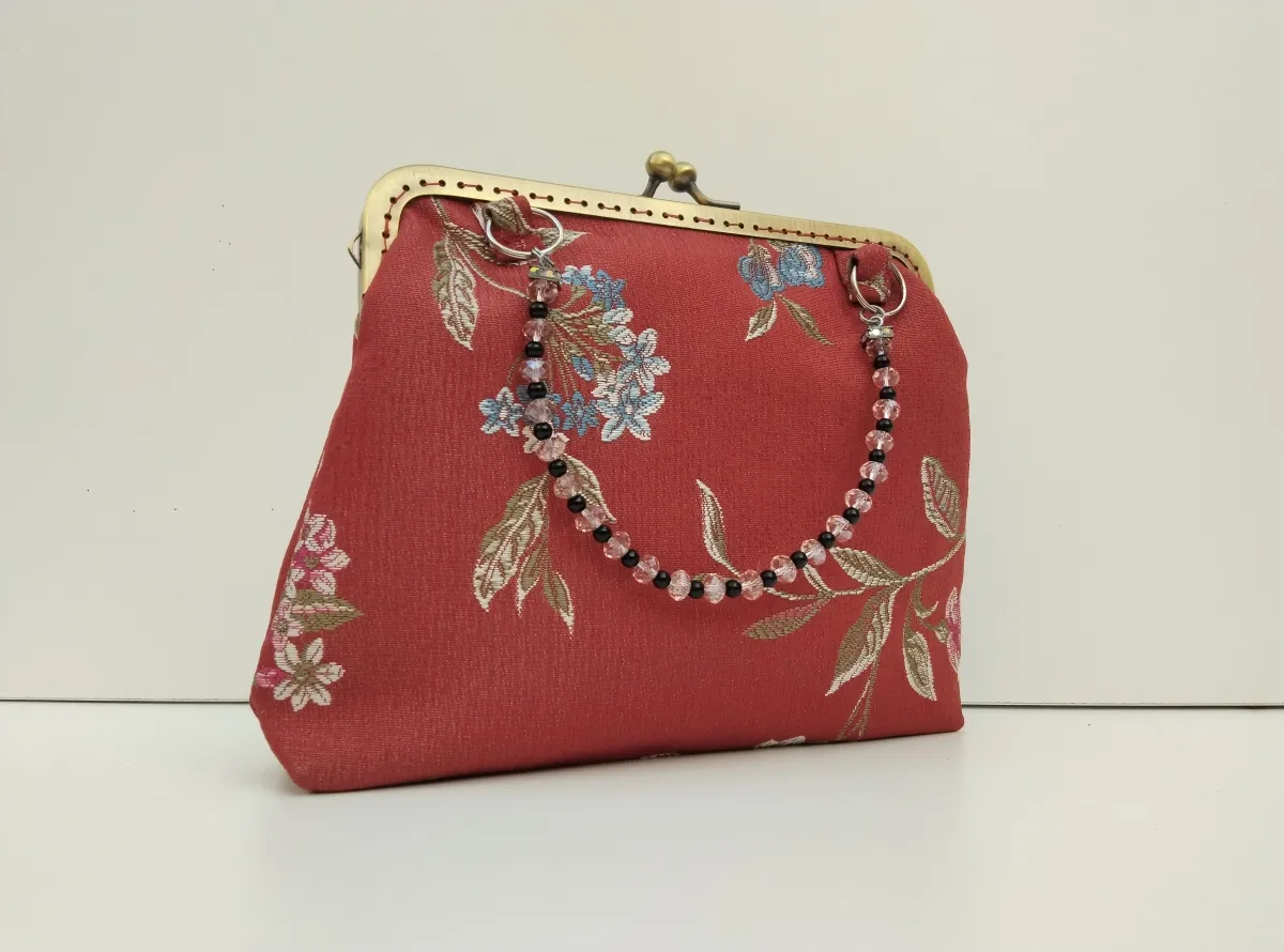 Bolso rojo teja floral