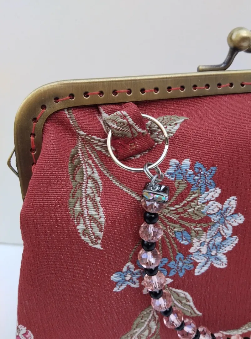 Bolso rojo teja floral