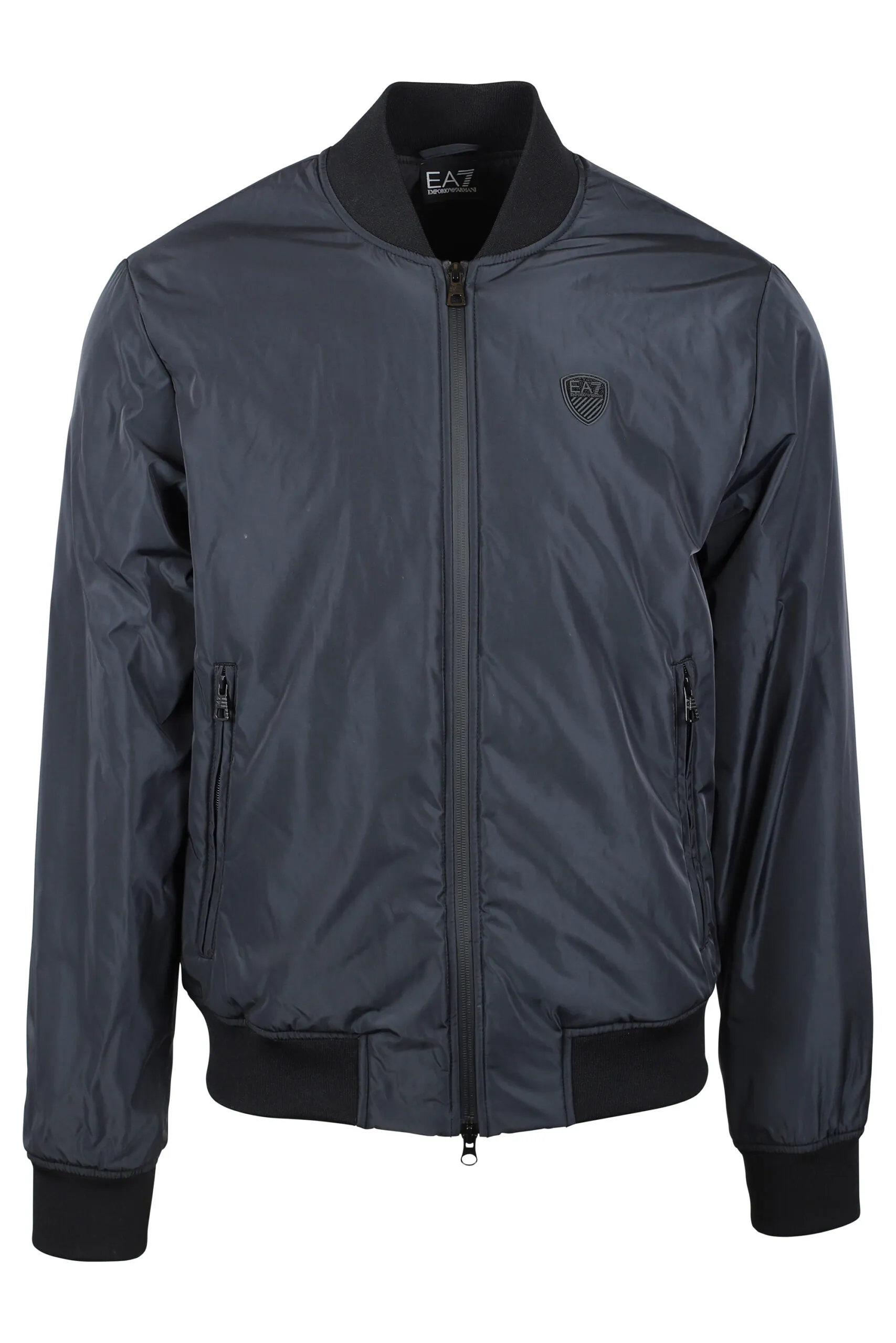 Chaqueta azul oscura con cremallera y mini placa de goma