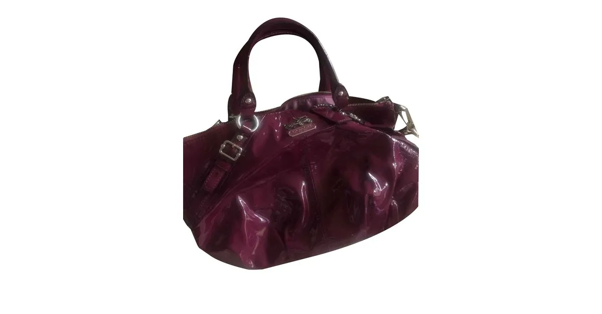 Coach Bolsos de mano Ciruela 