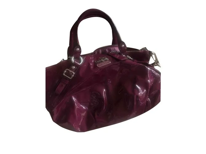 Coach Bolsos de mano Ciruela 