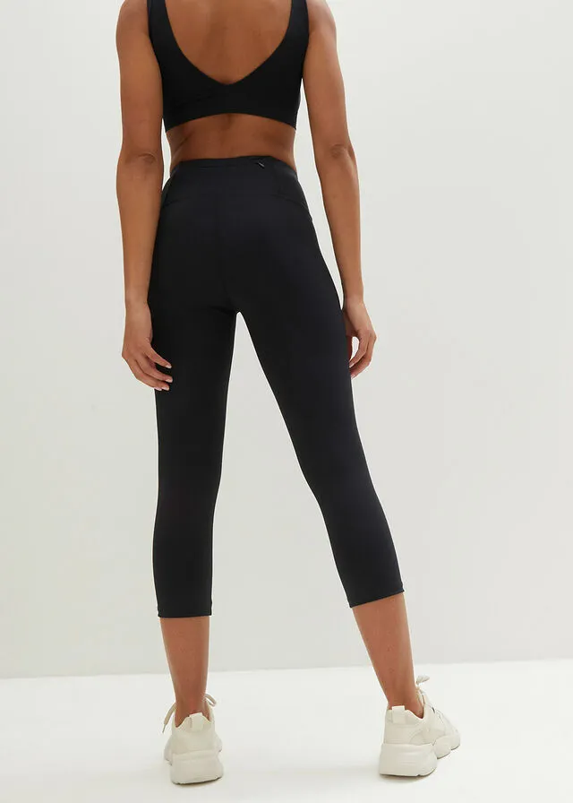 Leggings capri deportivos con bolsillo oculto en la cintura Negro