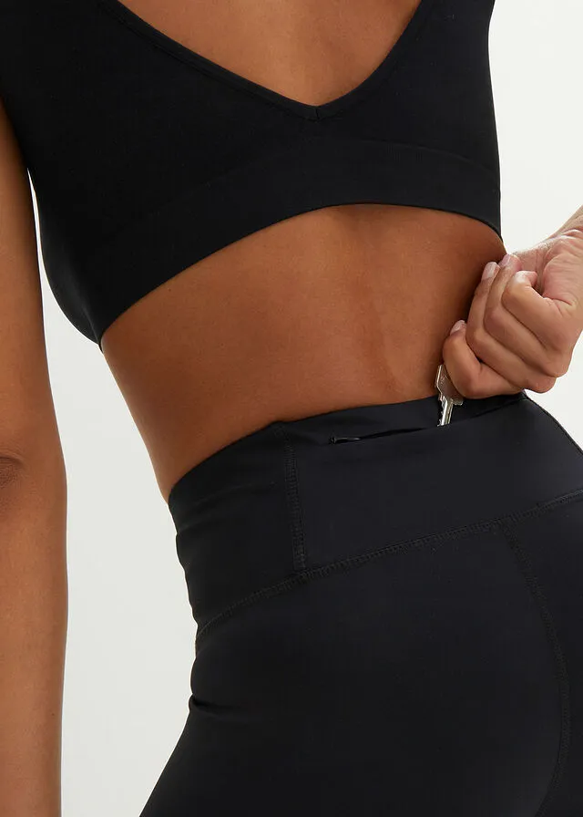 Leggings capri deportivos con bolsillo oculto en la cintura Negro