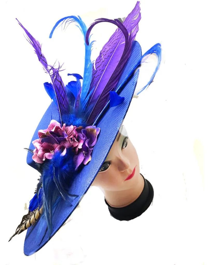 PAMELAS AZULONAS PARA BODAS CON FLORES Y PLUMAS EXOTICAS