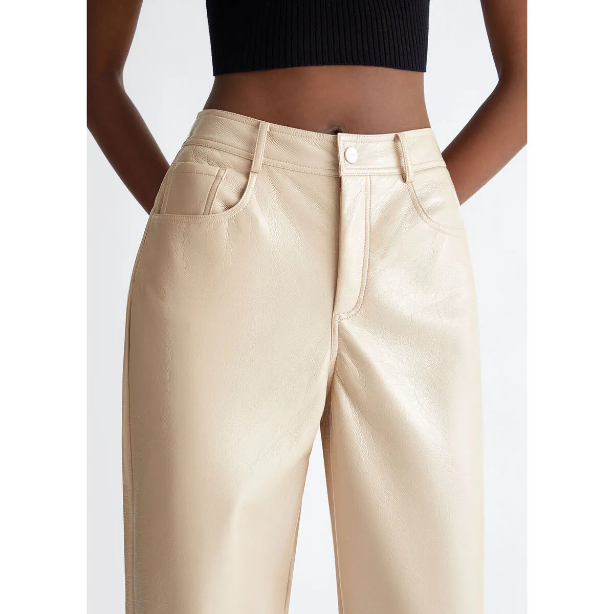 Pantalón de tejido revestido brillante
