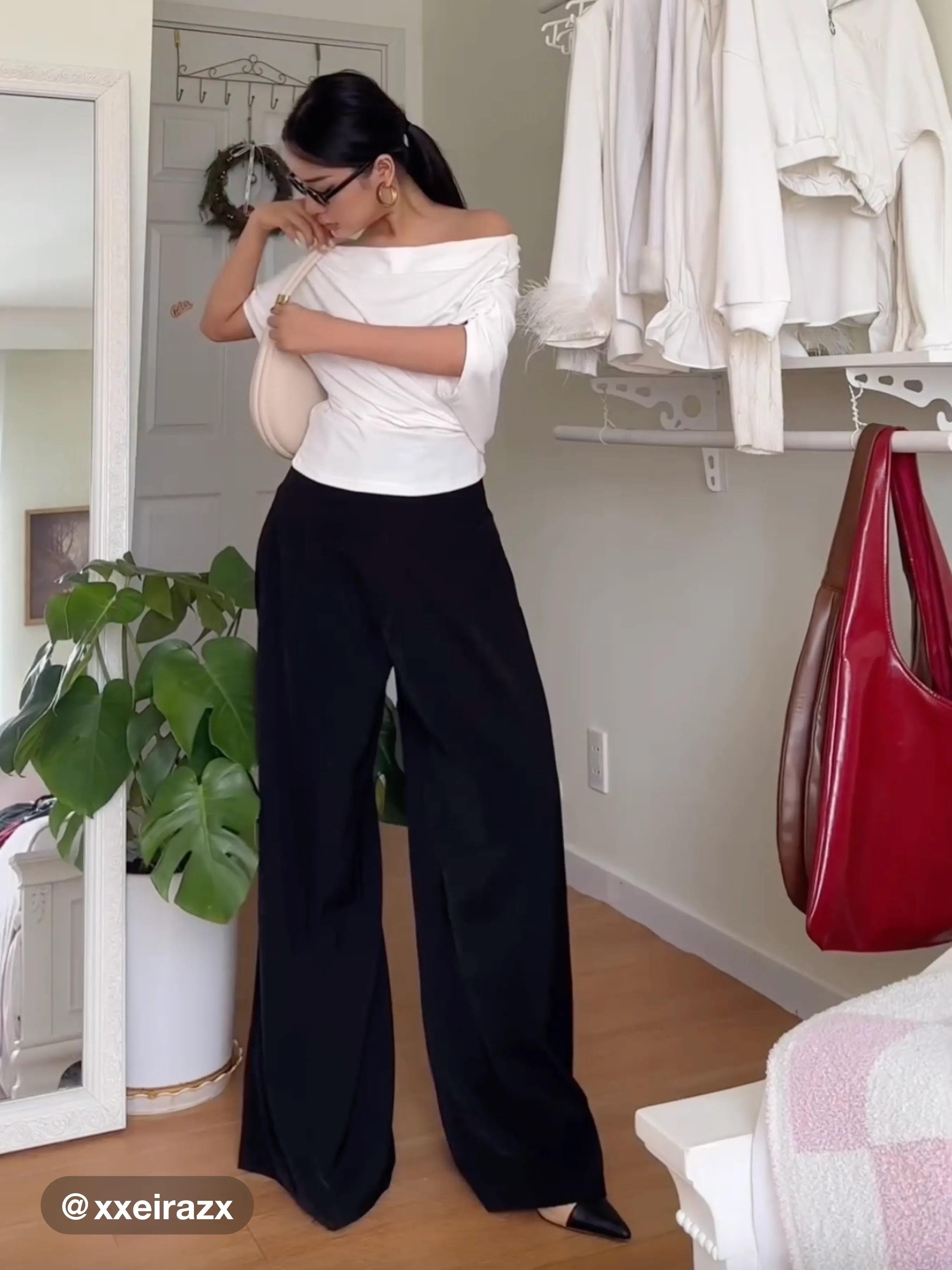 Pantalón tejido de cintura alta con pliegues y pierna ancha