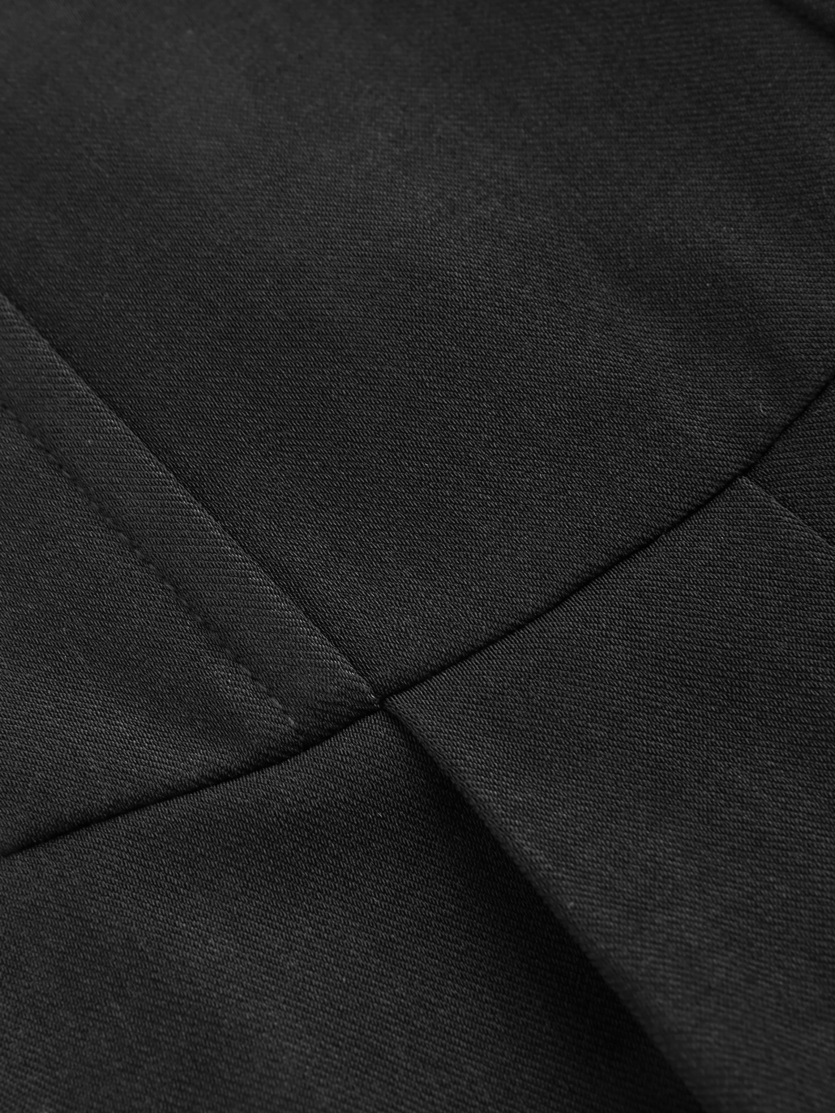 Pantalón tejido de cintura alta con pliegues y pierna ancha