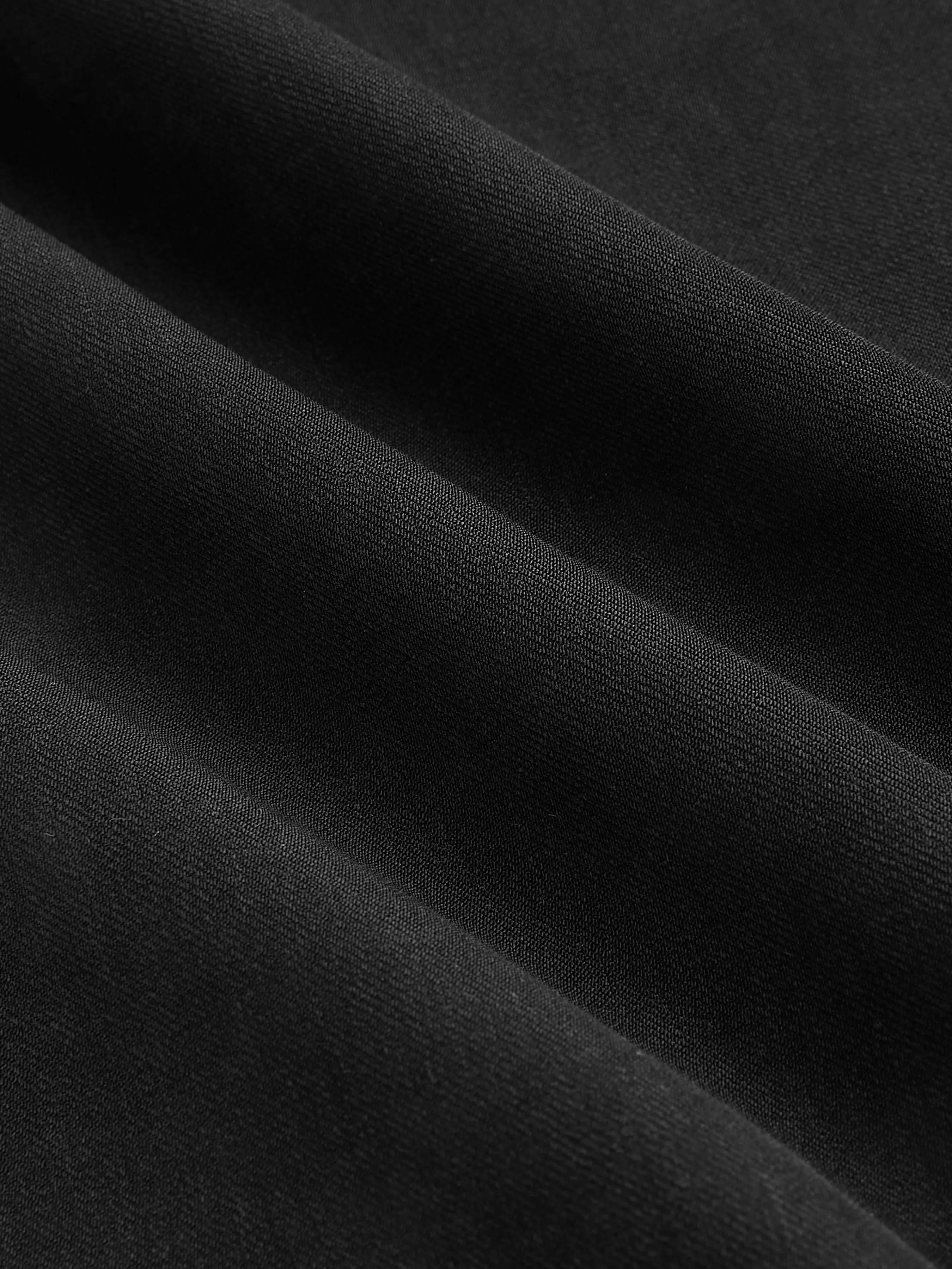 Pantalón tejido de cintura alta con pliegues y pierna ancha