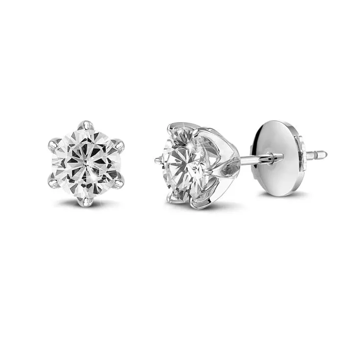 pendientes solitarios en oro blanco con diamantes redondos de 1.25 qt cada uno 