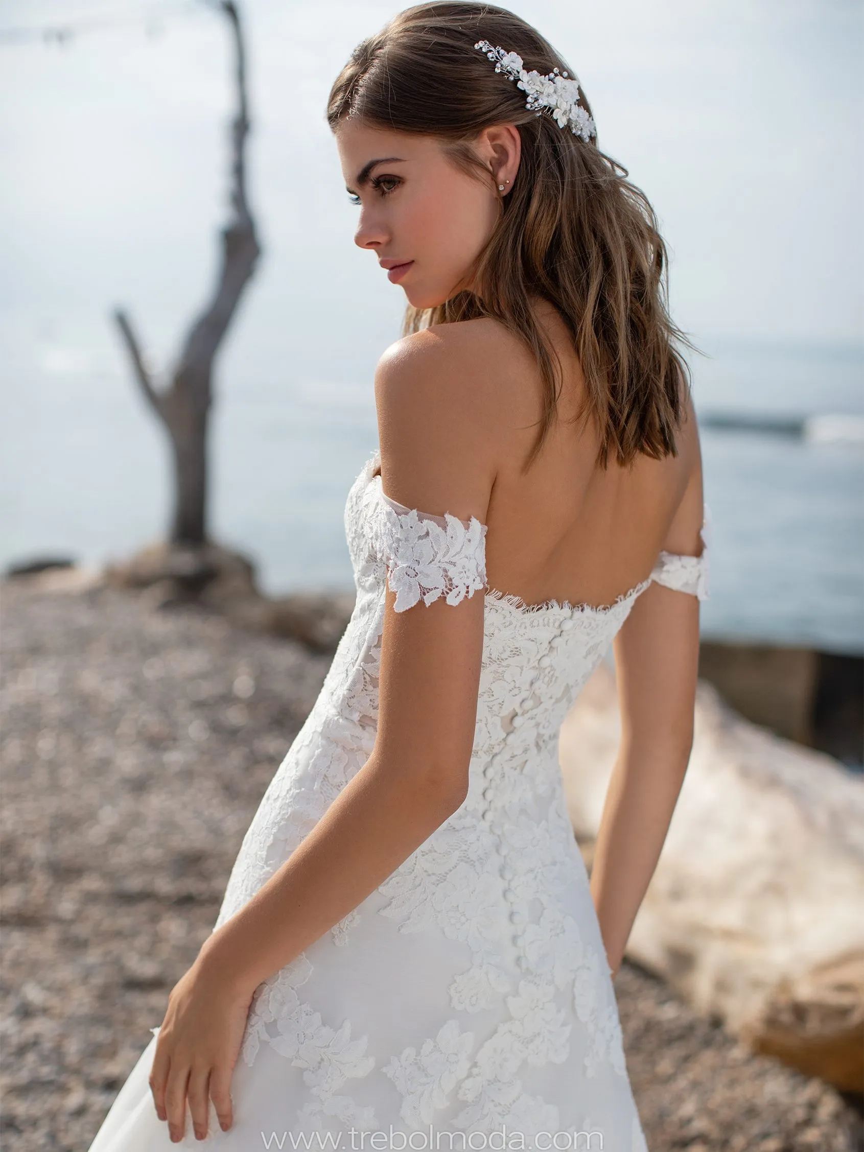 Vestido de novia con escote barco