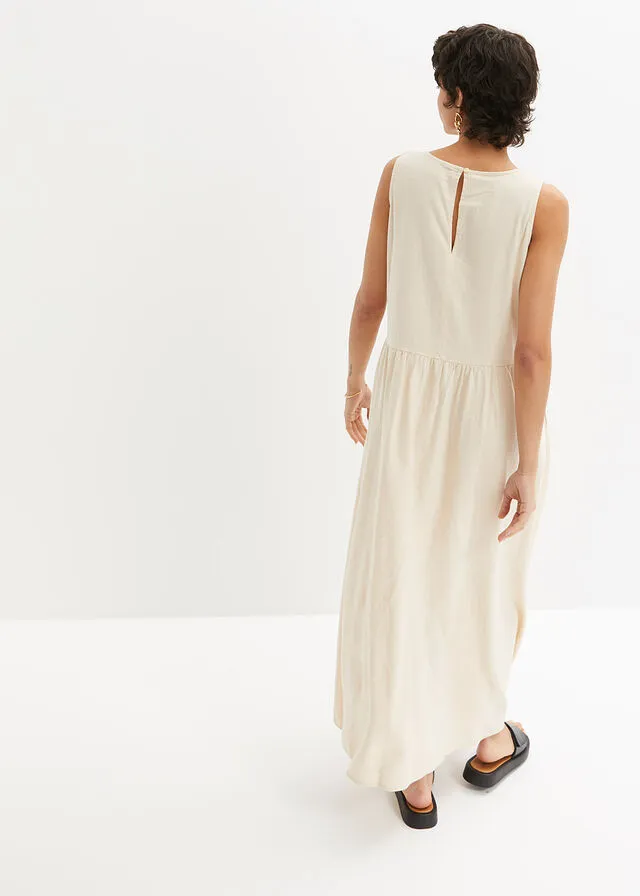 VESTIDO LARGO DE MALLA CON LINO Y PASACORDóN EN LA CINTURA BEIGEARENA